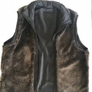 Men’s Andrew Marc Faux Fur sage reversible vest.